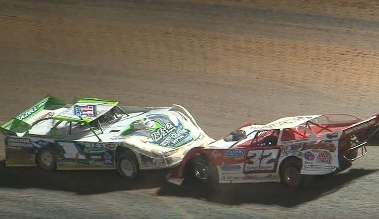 Tyler Erb drives into Bobby Pierce during Outlaws' USA Nationals